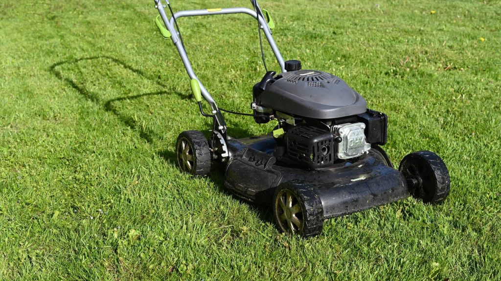 lawn mover on the green grass