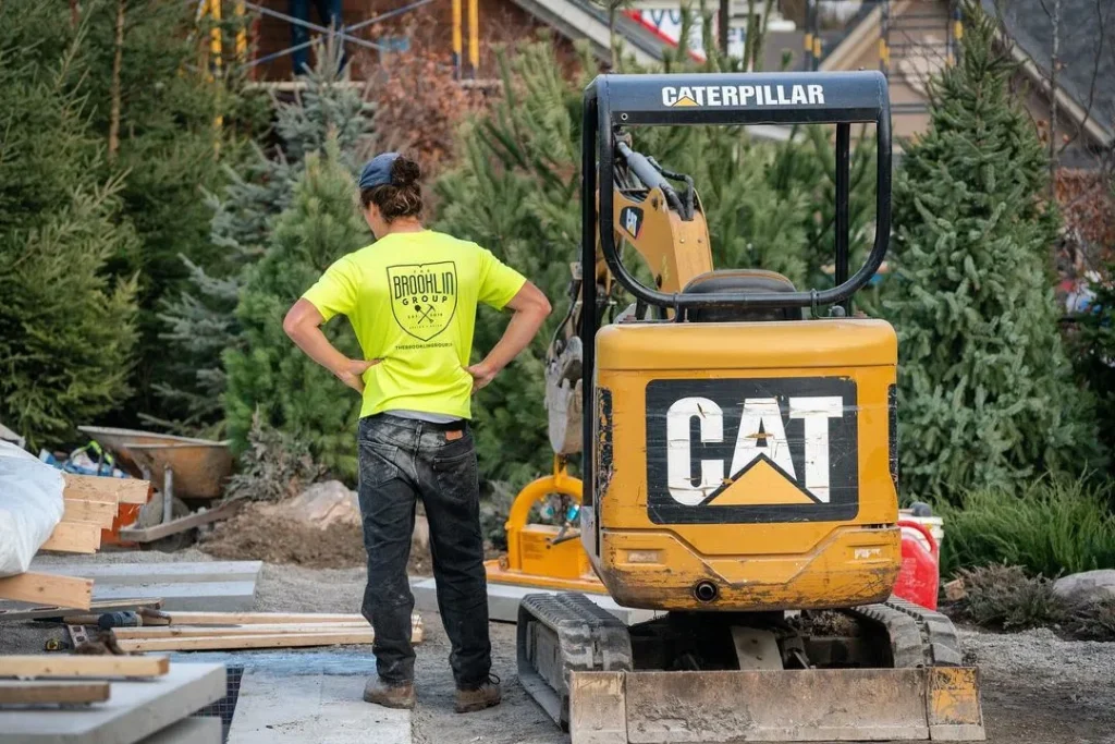 a crew member evaluating a job site