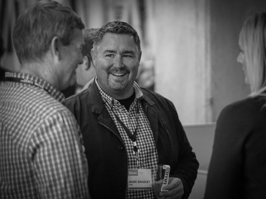 Mark Bradley LMN CEO at a networking event