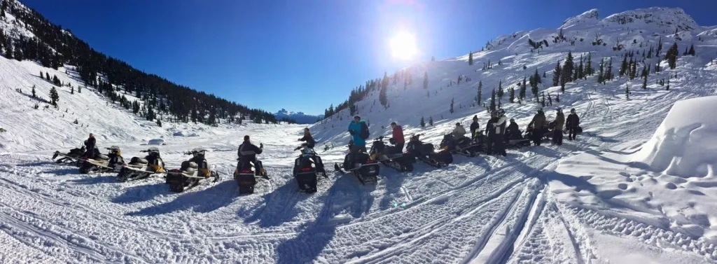 work crew gathering on a snowy mountain