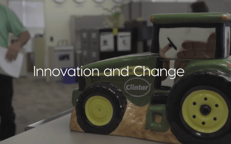 "Innovation and Change" - text over image of toy tractor on desk